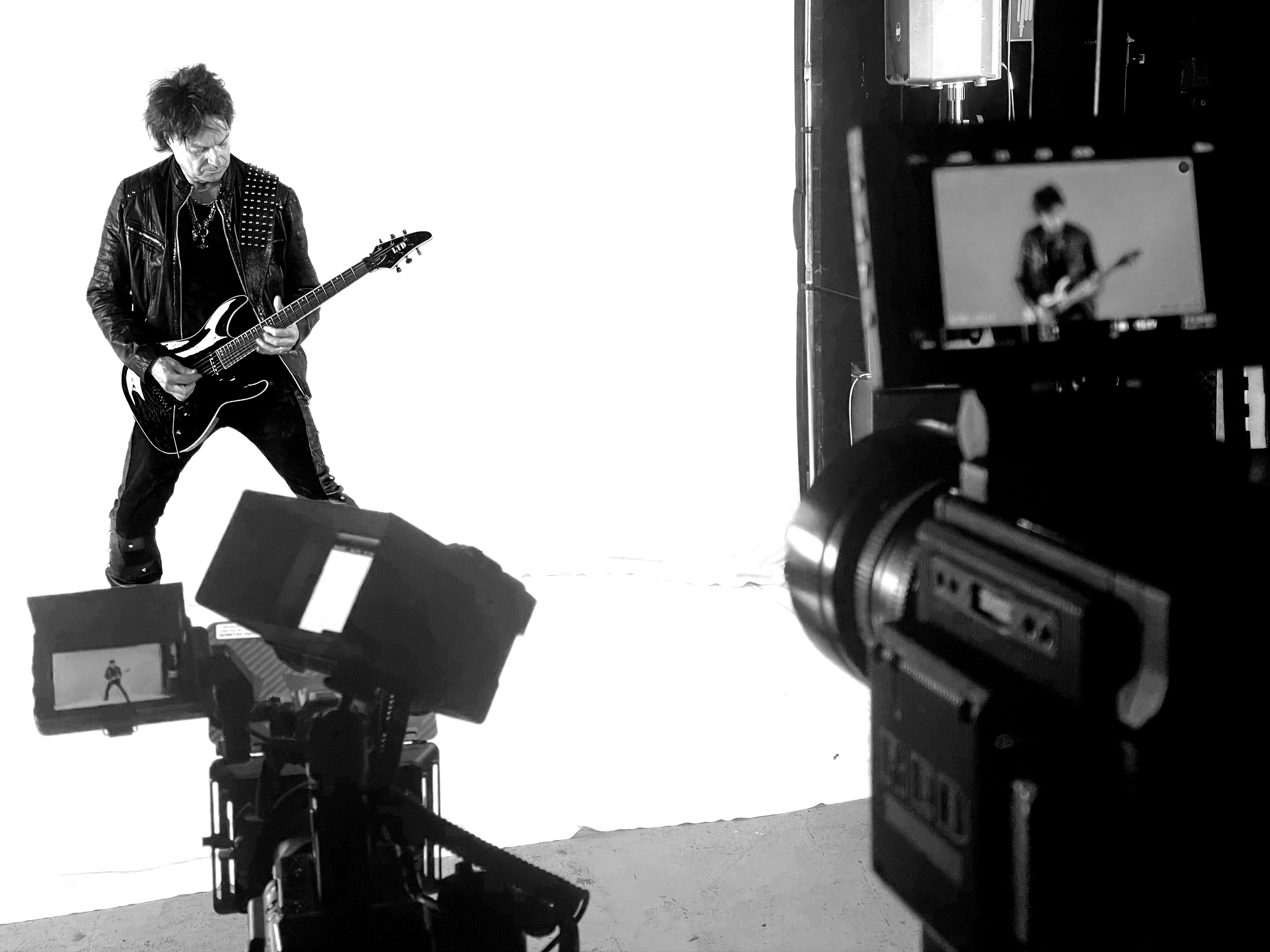 Patric Ullaeus on the set with Andy LaRocque