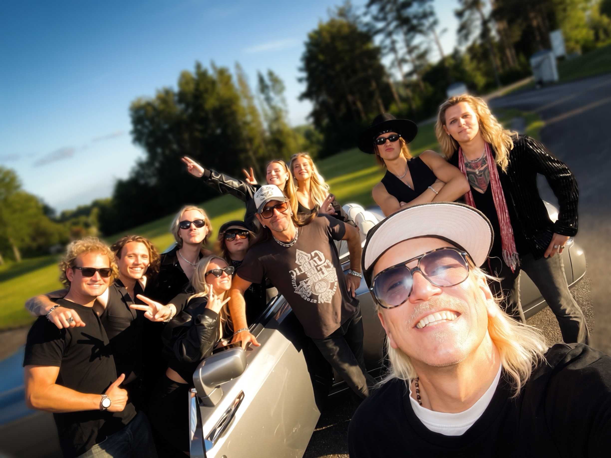 Patric Ullaeus with artists after a shoot